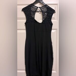 Black fitted dress.